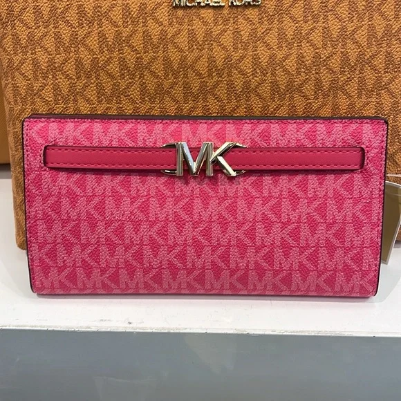 MICHAEL KORS
Reed Large Snap Signature Wallet
Electric Pink NWT - Picture 9 of 16
